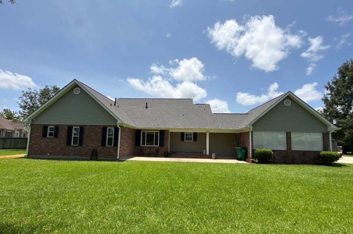 Completed residential shingle roof on a Louisiana home